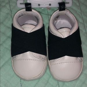 White slip on crib shoe